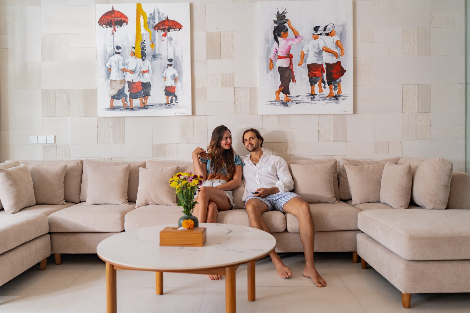 Modern dark-toned room with art wall