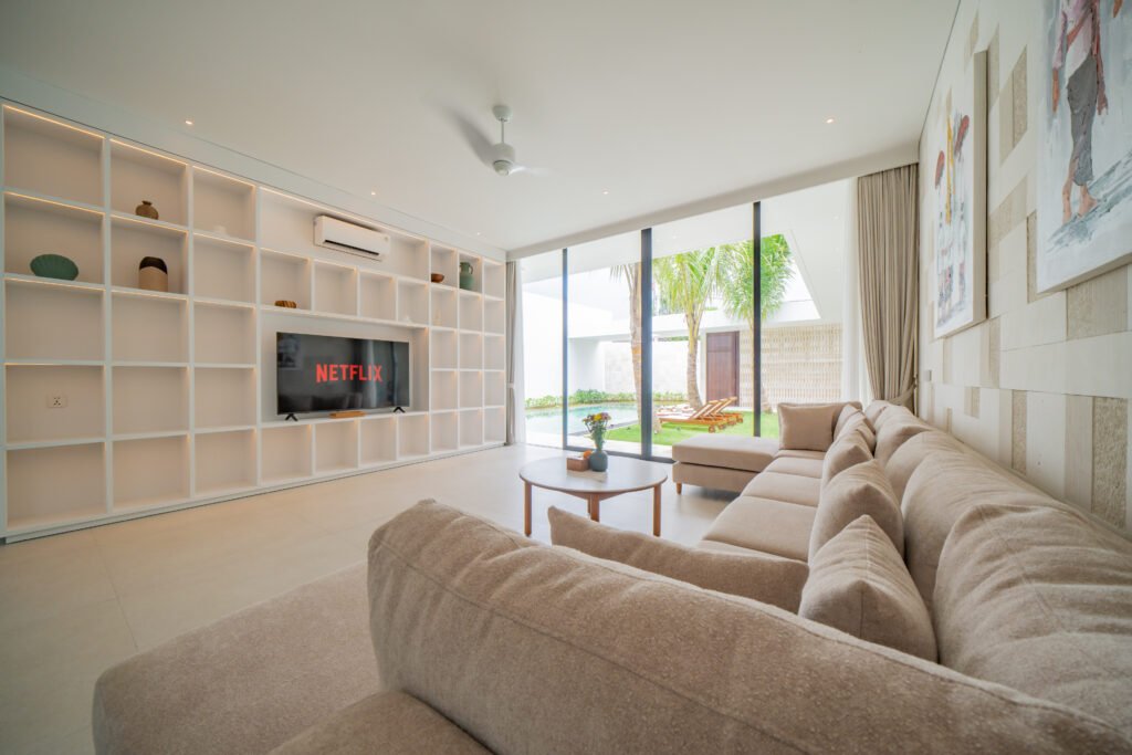 Living Room Villa Shanaya Parerenan – Sofa & Built-in Shelves Angle